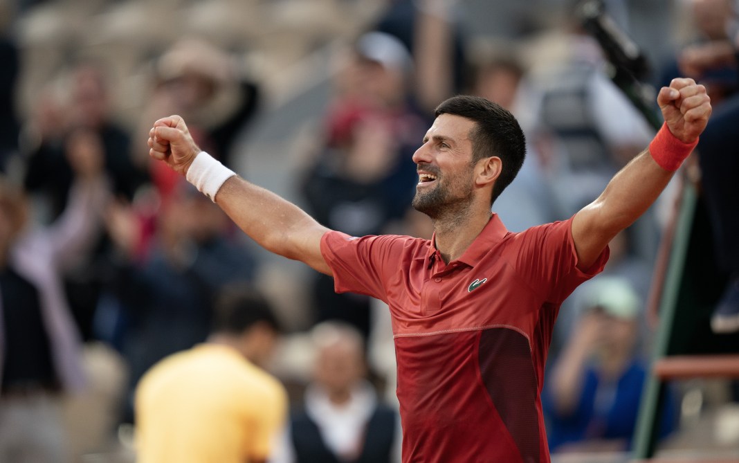 Novak Djokovic celebrates a win over Francisco Cerundolo at the 2024 French Open.