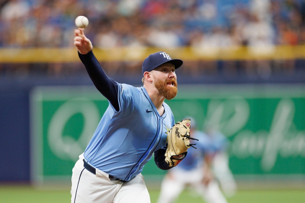 zack littell throws a pitch for the tampa bay rays