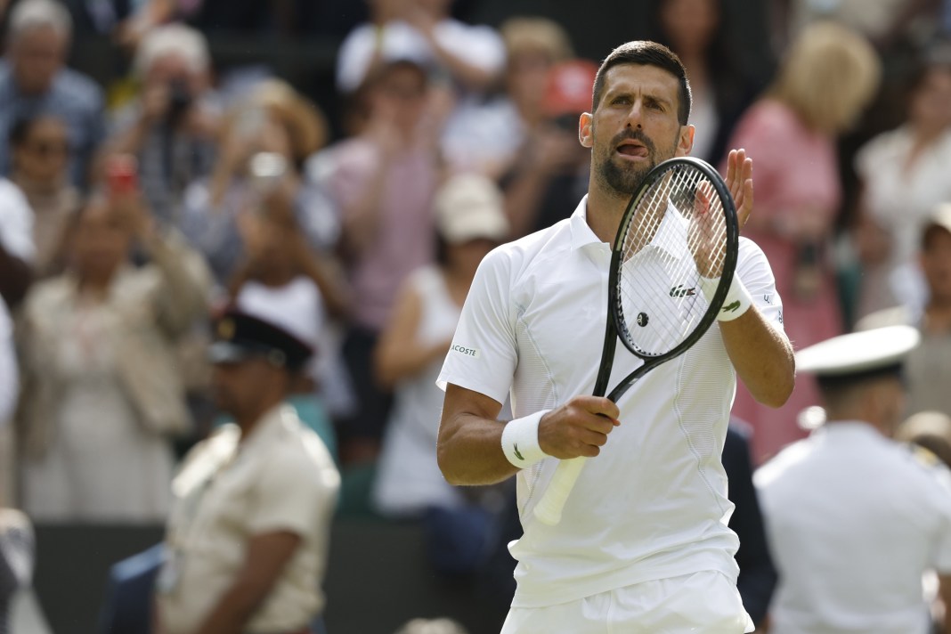 Novak Djokovic gestures to the crowd after a win over Jacob Fearnley at Wimbledon.