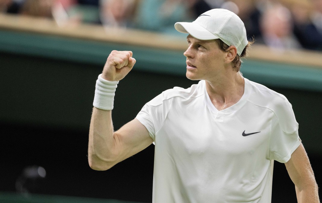 Jannik Sinner celebrates a big win over Ben Shelton at Wimbledon.