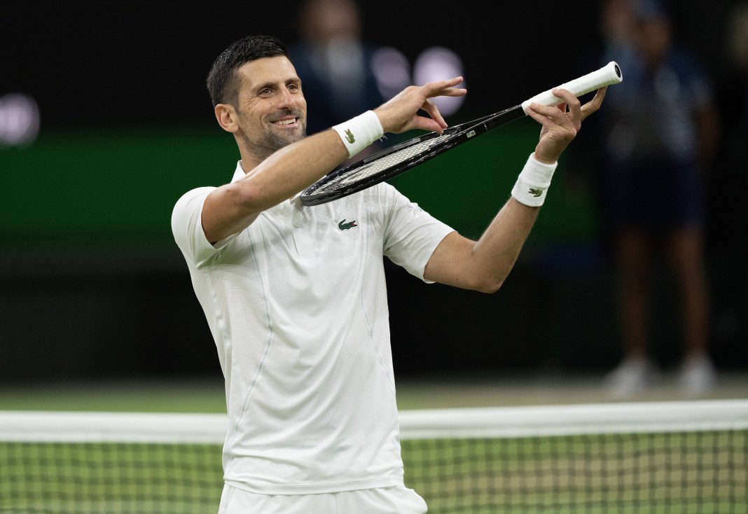 Novak Djokovic toys with the crowd after his win over Holger Rune at Wimbledon.