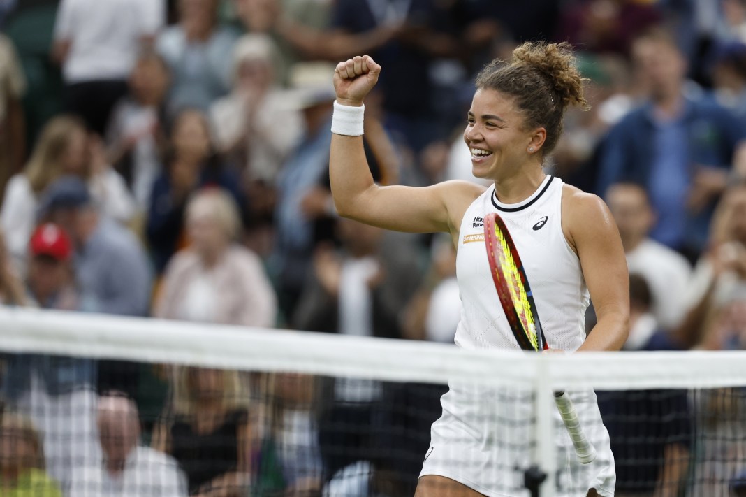 Jasmine Paolini celebrates her win over Emma Navarro in the Wimbledon quarterfinals.