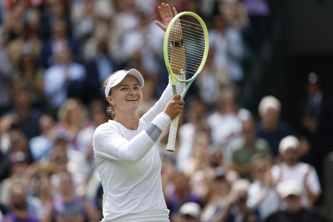 Barbora Krejcikova celebrates a win over Jelena Ostapenko in the Wimbledon quarterfinals.