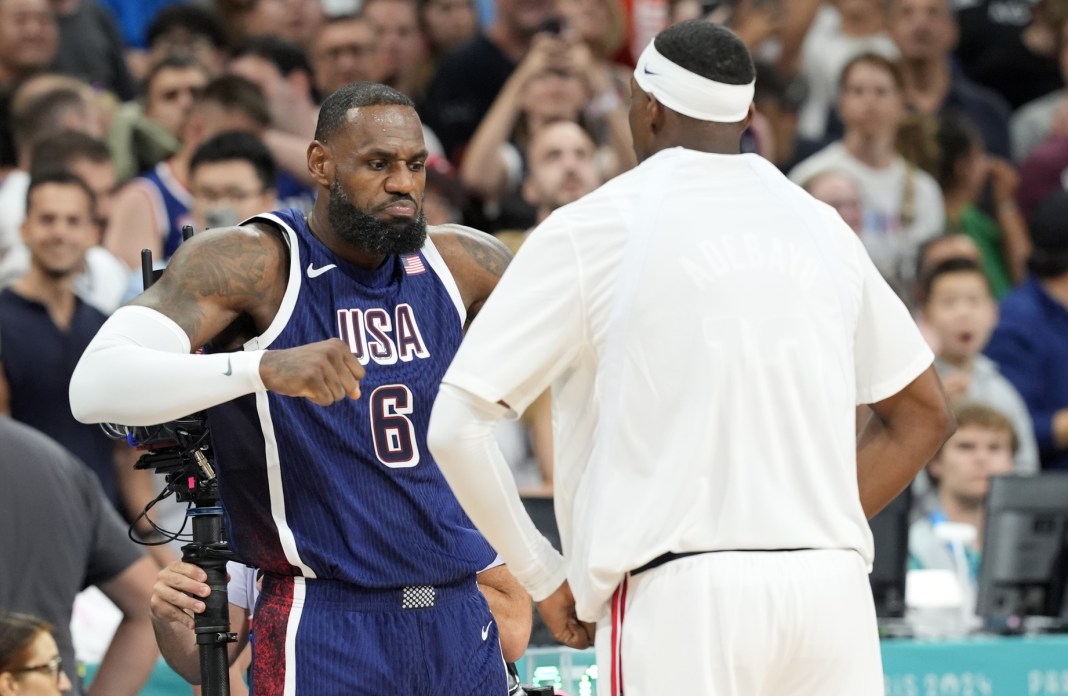 LeBron James gets ready for a Team USA meeting with Serbia at the 2024 Paris Olympics.