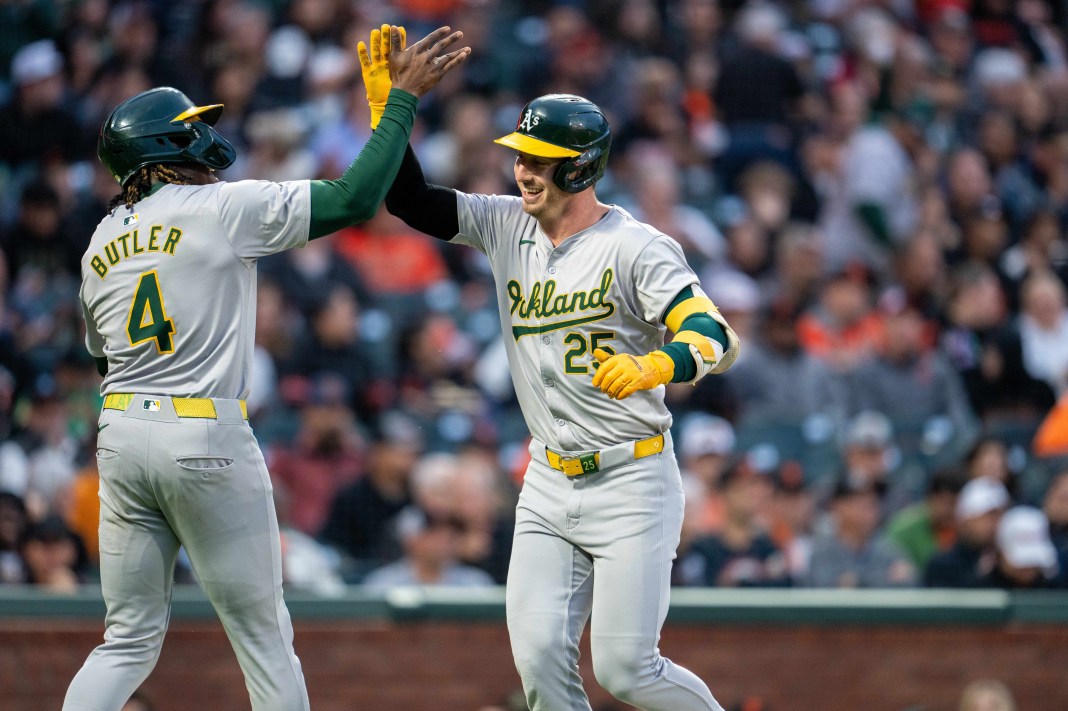 brent rooker hits a home run for the oakland athletics