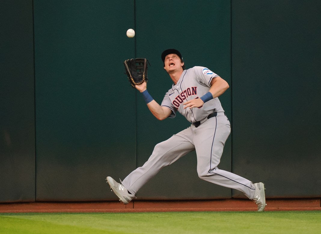 Houston Astros center fielder Jake Myers (6) catches the ball against the Oakland Athletics during the fifth inning at Oakland-Alameda County Coliseum.