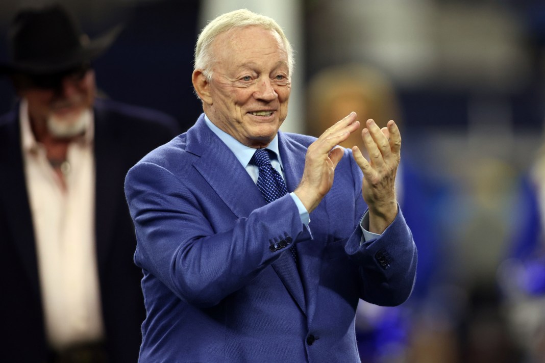 Dallas Cowboys owner Jerry Jones applauds during the Ring of Honor induction ceremony at half time in the game against the Detroit Lions