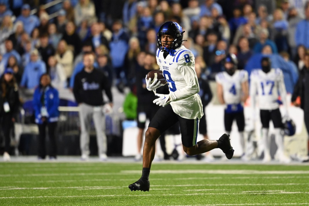 Duke Blue Devils wide receiver Jordan Moore (8) with the ball in the first overtime at Kenan Memorial Stadium