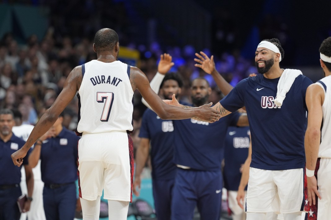 Kevin Durant celebrates with his Team USA teammates at the 2024 Paris Olympics.