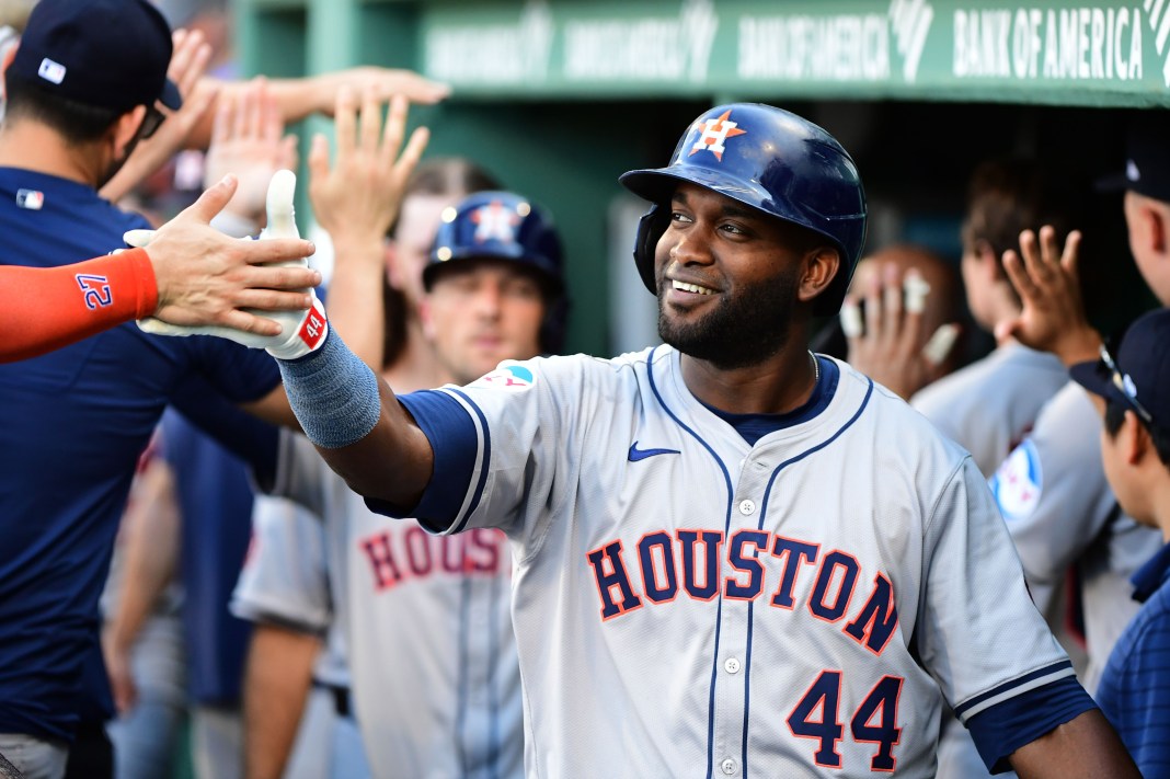 Houston Astros left fielder Yordan Alavarez (44) is greeted in the dugout after hitting a two run home run during the sixth inning against the Boston Red Sox