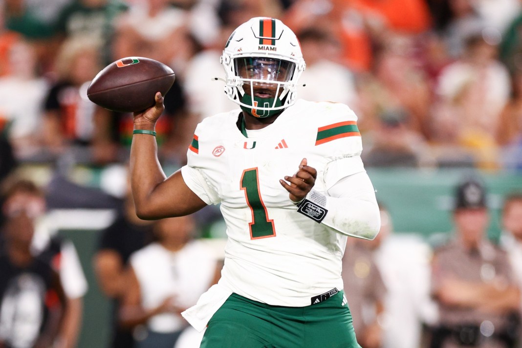 Miami quarterback Cam Ward throws a pass against South Florida.