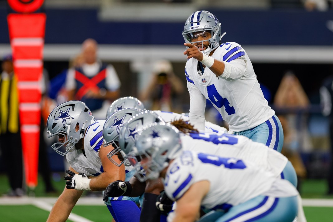 Dallas Cowboys quarterback Dak Prescott adjusts at the line of scrimmage against the Baltimore Ravens in Week 3 of the 2024 NFL season.