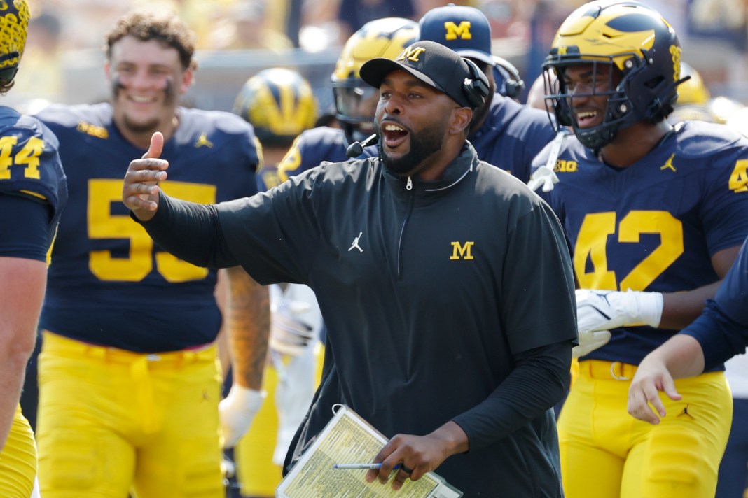 Michigan Wolverines head coach Sherrone Moore reacts on the sideline during the second half against the Arkansas State Red Wolves at Michigan Stadium.