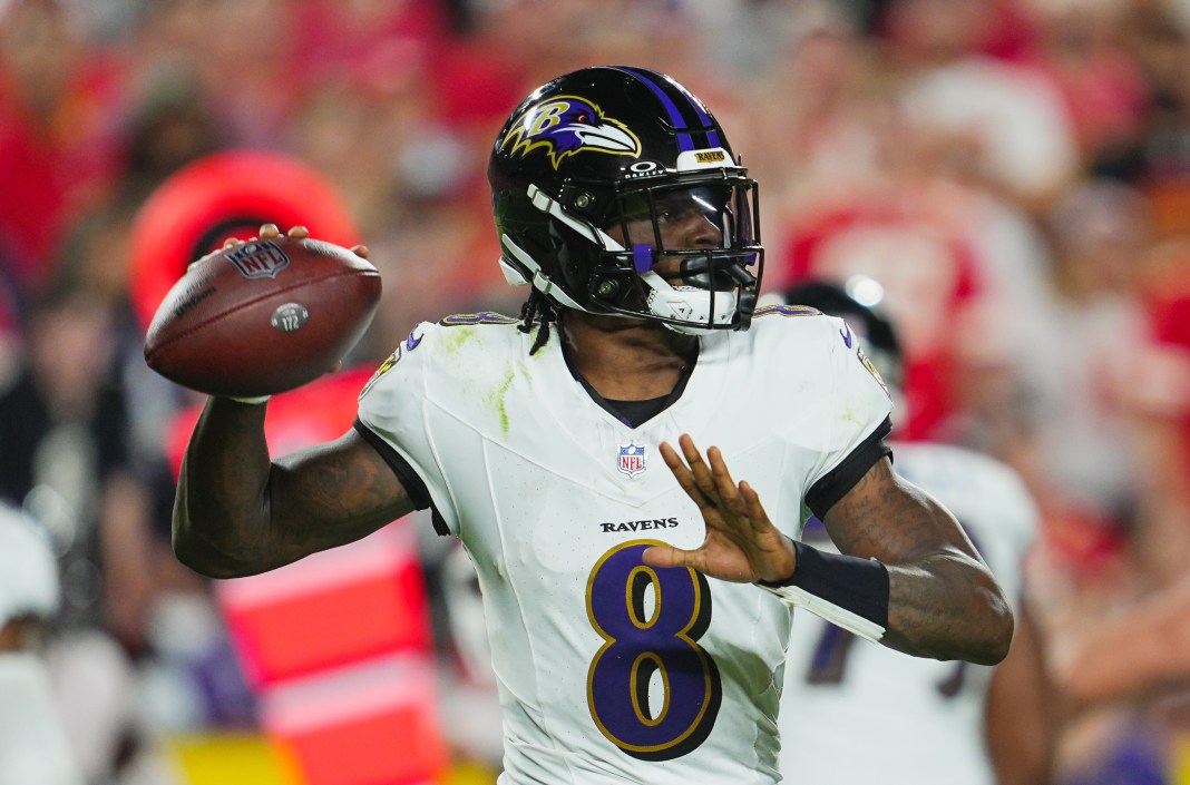 Baltimore Ravens quarterback Lamar Jackson (8) throws a pass during the first half against the Kansas City Chiefs