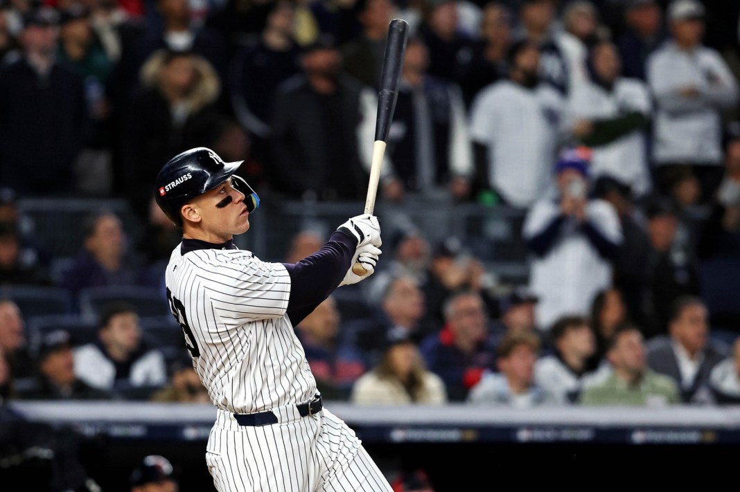 New York Yankees outfielder Aaron Judge (99) hits a two run home run during the seventh inning against the Cleveland Guardians