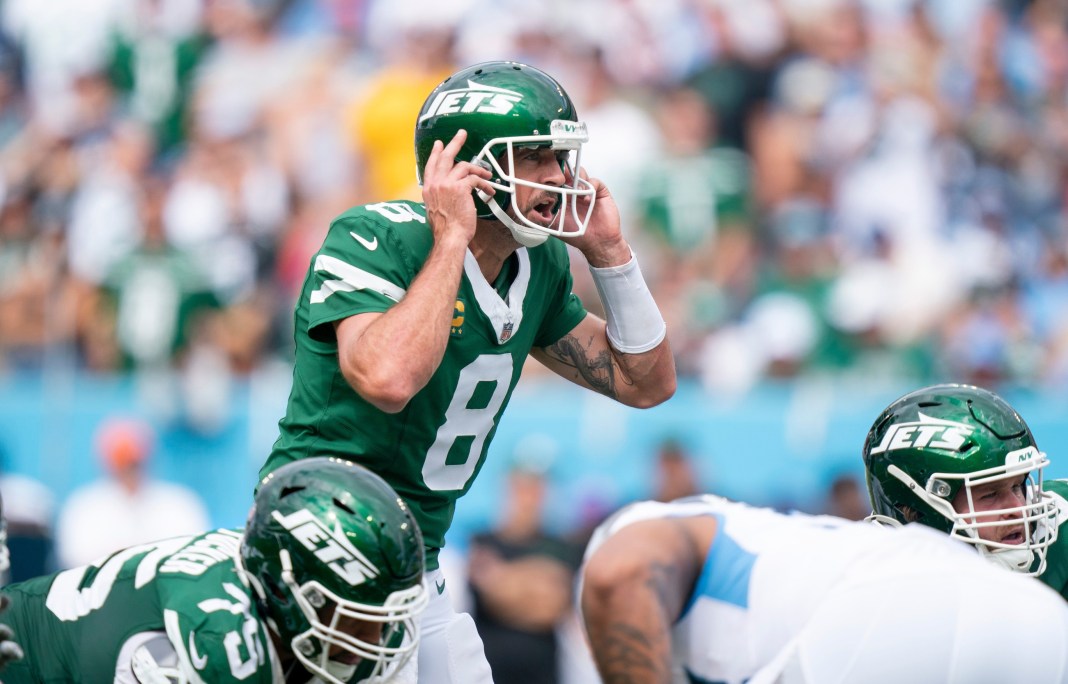 New York Jets quarterback Aaron Rodgers (8) calls a play against the Tennessee Titans during their game at Nissan Stadium