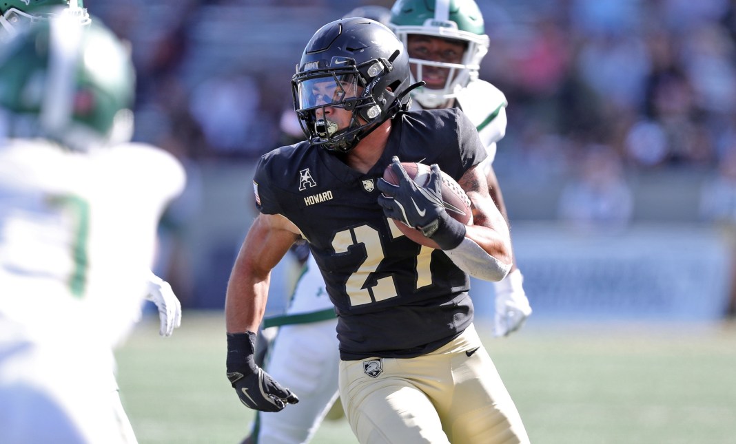 Army Black Knights running back Samari Howard (27) carries the ball against the UAB Blazers