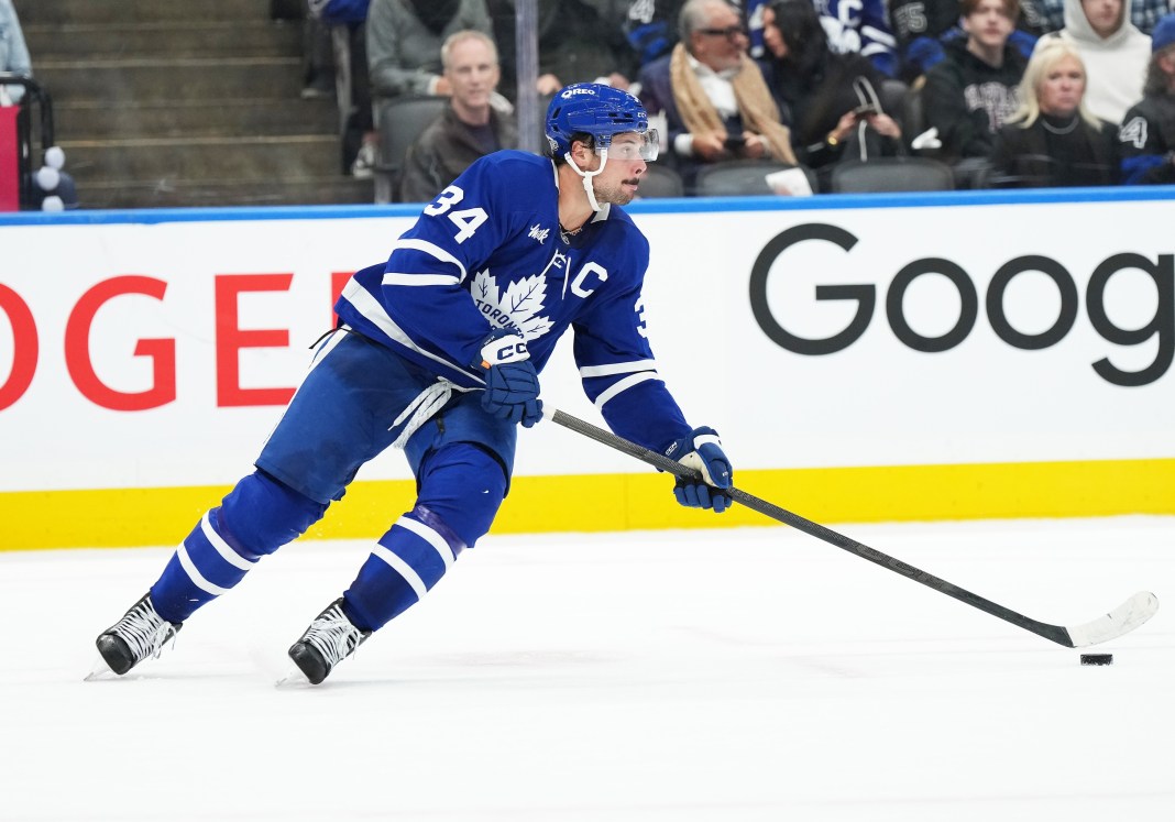 Toronto Maple Leafs center Auston Matthews (34) skates with the puck against the Pittsburgh Penguins during the second period at Scotiabank Arena