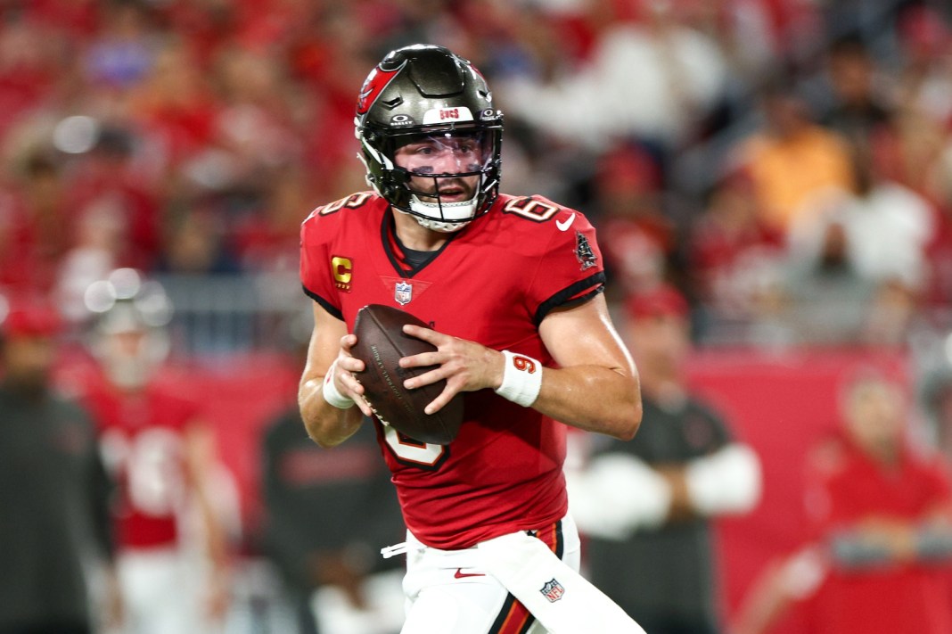 Tampa Bay Buccaneers quarterback Baker Mayfield (6) drops back to pass against the Baltimore Ravens