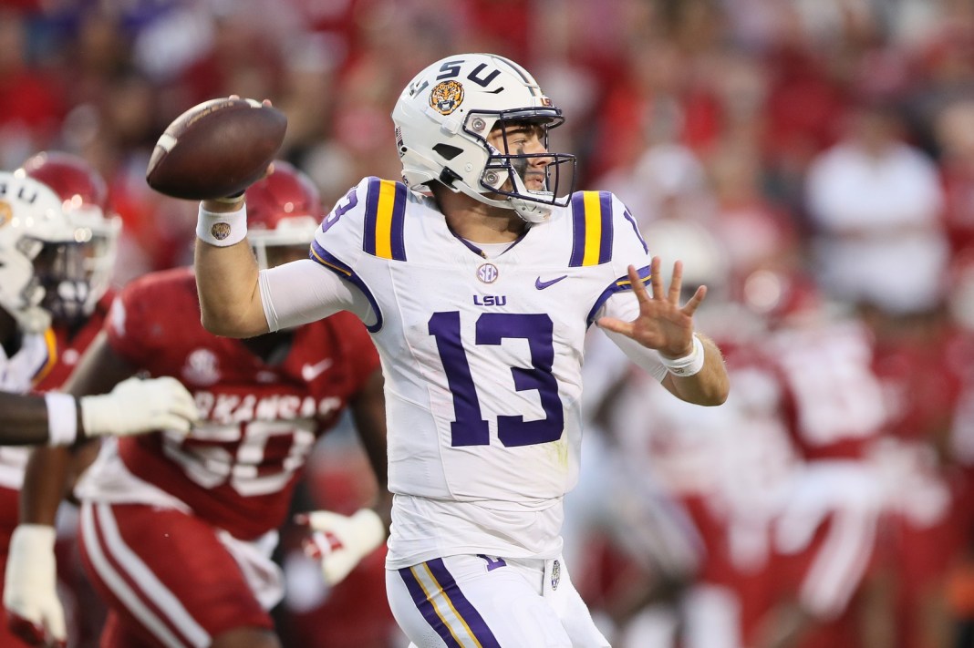 LSU Tigers quarterback Garrett Nussmeier (13) passes during the first quarter against the Arkansas Razorbacks