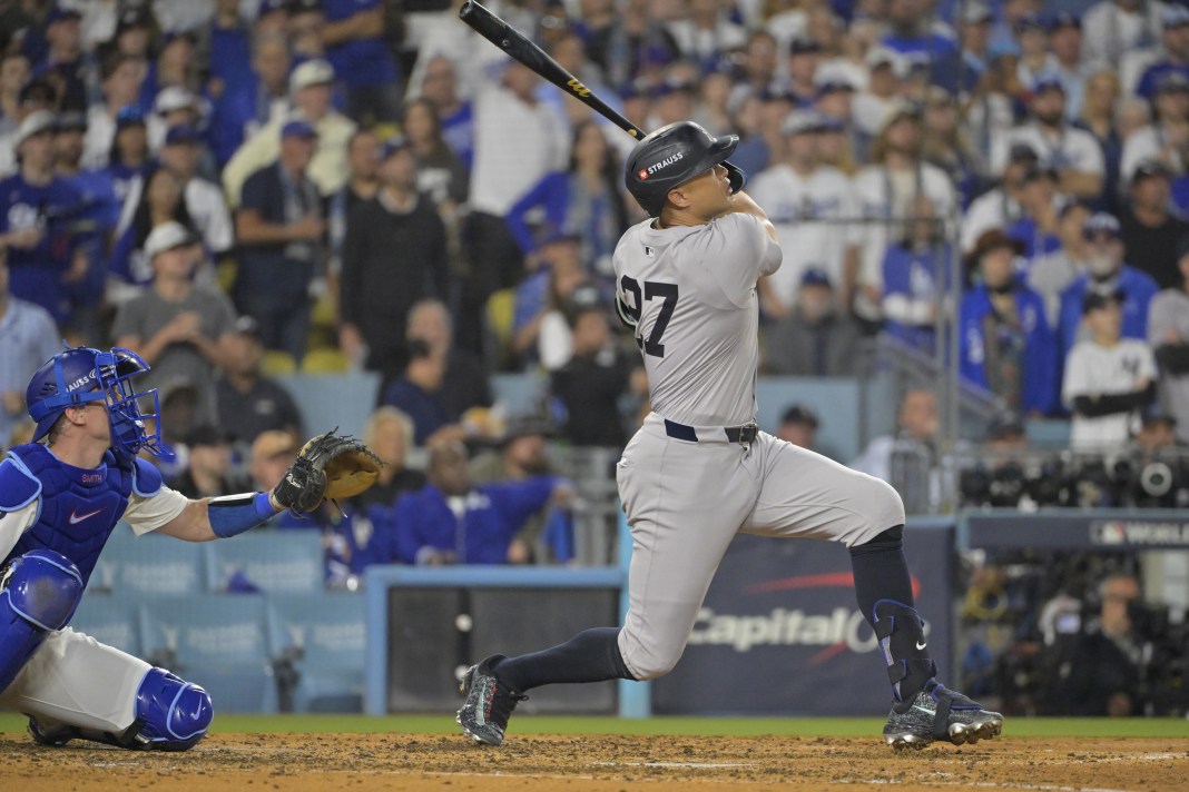 New York Yankees designated hitter Giancarlo Stanton (27) hits two-run home run in the sixth inning against the Los Angeles Dodgers