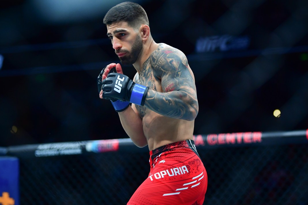 Ilia Topuria fights against Alexander Volkanovski during UFC 298 at Honda Center.