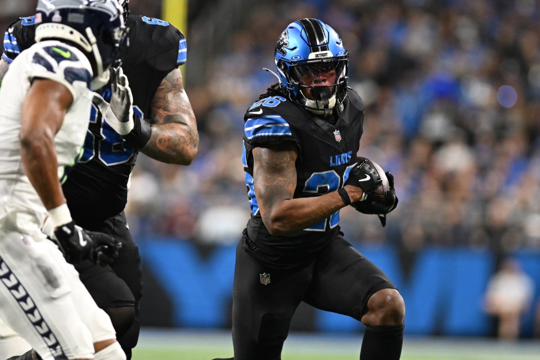 Detroit Lions running back Jahmyr Gibbs (26) runs the ball against the Seattle Seahawks in the fourth quarter at Ford Field