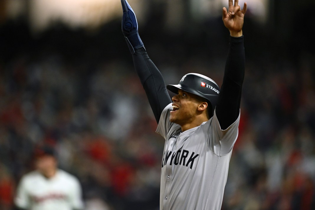 New York Yankees outfielder Juan Soto (22) celebrates on third base after three run home run by designated hitter Giancarlo Stanton