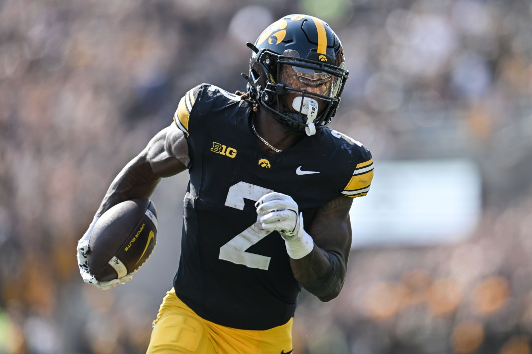 Iowa Hawkeyes running back Kaleb Johnson (2) runs for a 17 yard touchdown run during the second quarter against the Washington Huskies at Kinnick Stadium