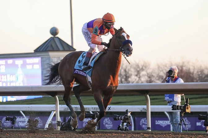 John Velazquez aboard Authentic (9) crosses the finish line after winning the Breeders' Cup Classic during the 37th Breeders Cup World Championship at Keeneland Race Track.