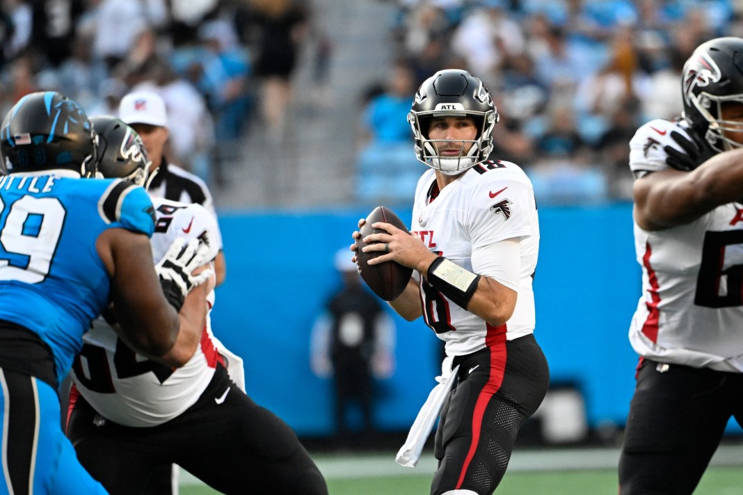 Atlanta Falcons quarterback Kirk Cousins (18) prepares to throw the ball in the second quarter at Bank of America Stadium