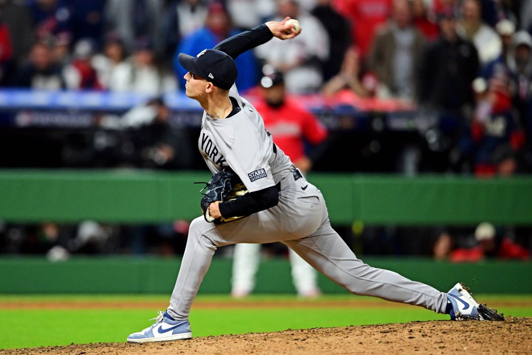 New York Yankees pitcher Luke Weaver (30) pitches during the ninth inning against the Cleveland Guardians