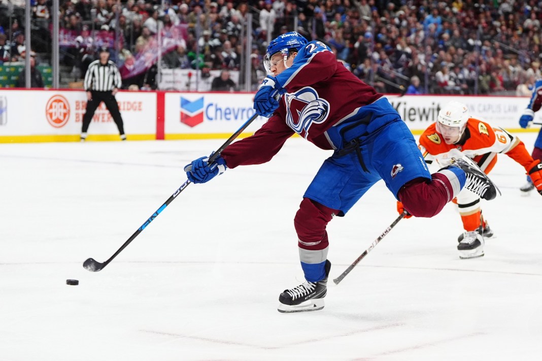 Colorado Avalanche center Nathan MacKinnon (29) shoots the puck in the second period against the Anaheim Ducks at Ball Arena