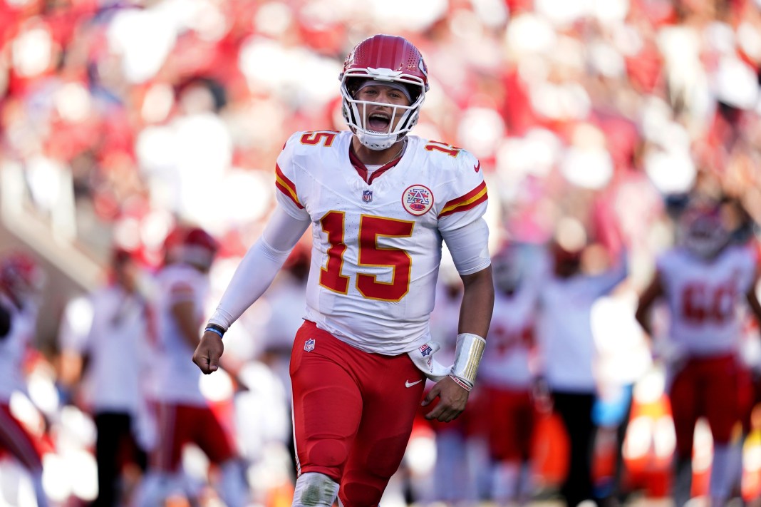 Kansas City Chiefs quarterback Patrick Mahomes (15) reacts after the Chiefs scored a touchdown against the San Francisco 49ers