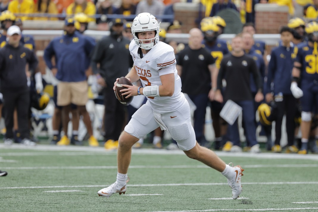 Texas Longhorns quarterback Quinn Ewers (3) passes in the second half against the Michigan Wolverines at Michigan Stadium