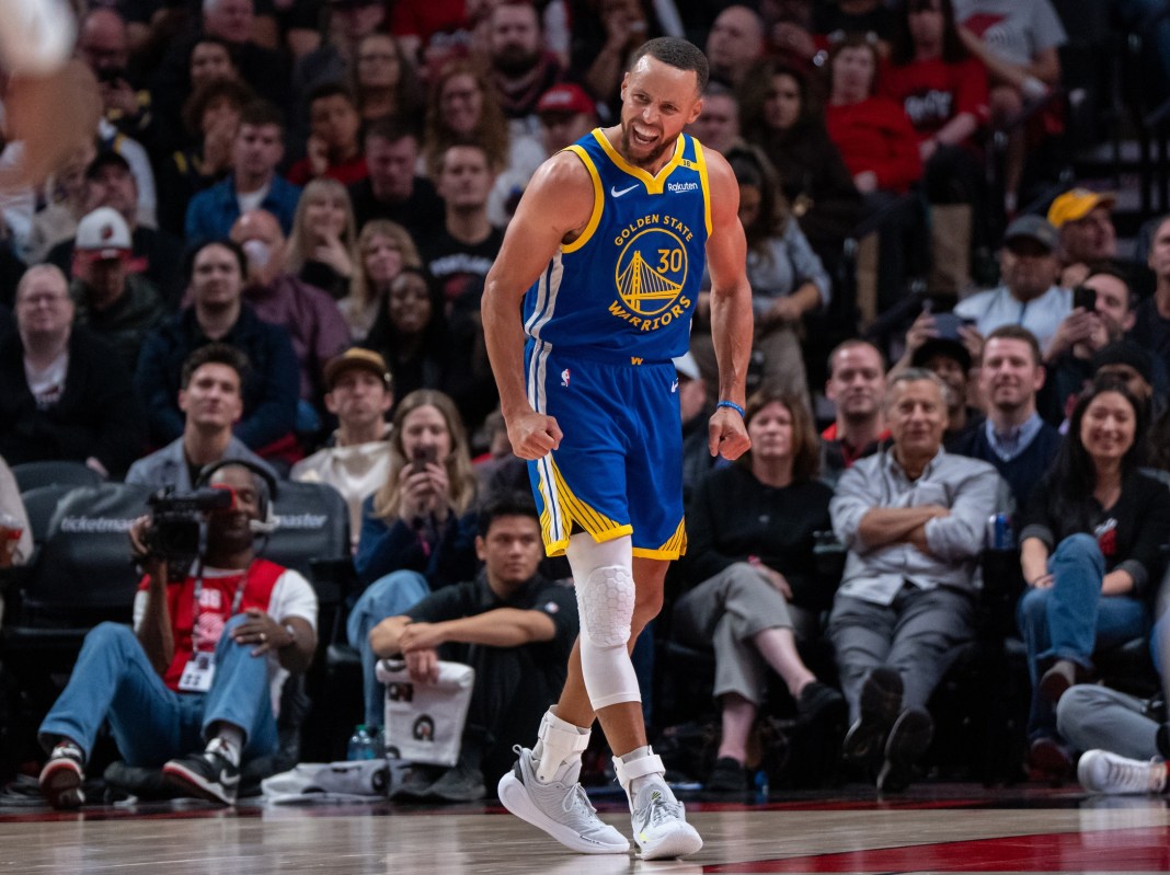 Golden State Warriors point guard Stephen Curry (30) reacts during the second half against the Portland Trailblazers at Moda Center