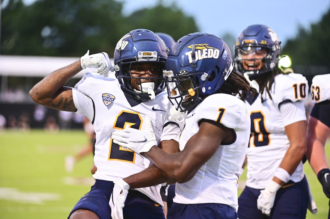 Toledo Rockets wide receiver Junior Vandeross III (2) reacts with Toledo Rockets wide receiver Jerjuan Newton (1) after a touchdown against Mississippi State Bulldogs