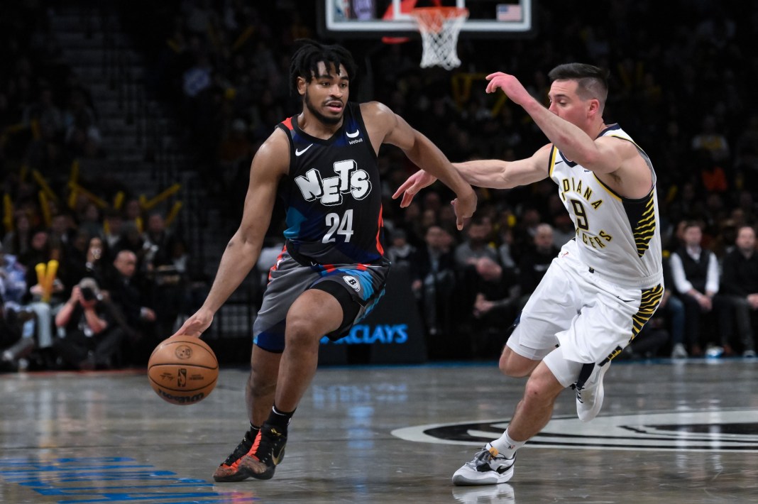 Nets guard Cam Thomas drives to the rim in a game against the Pacers.