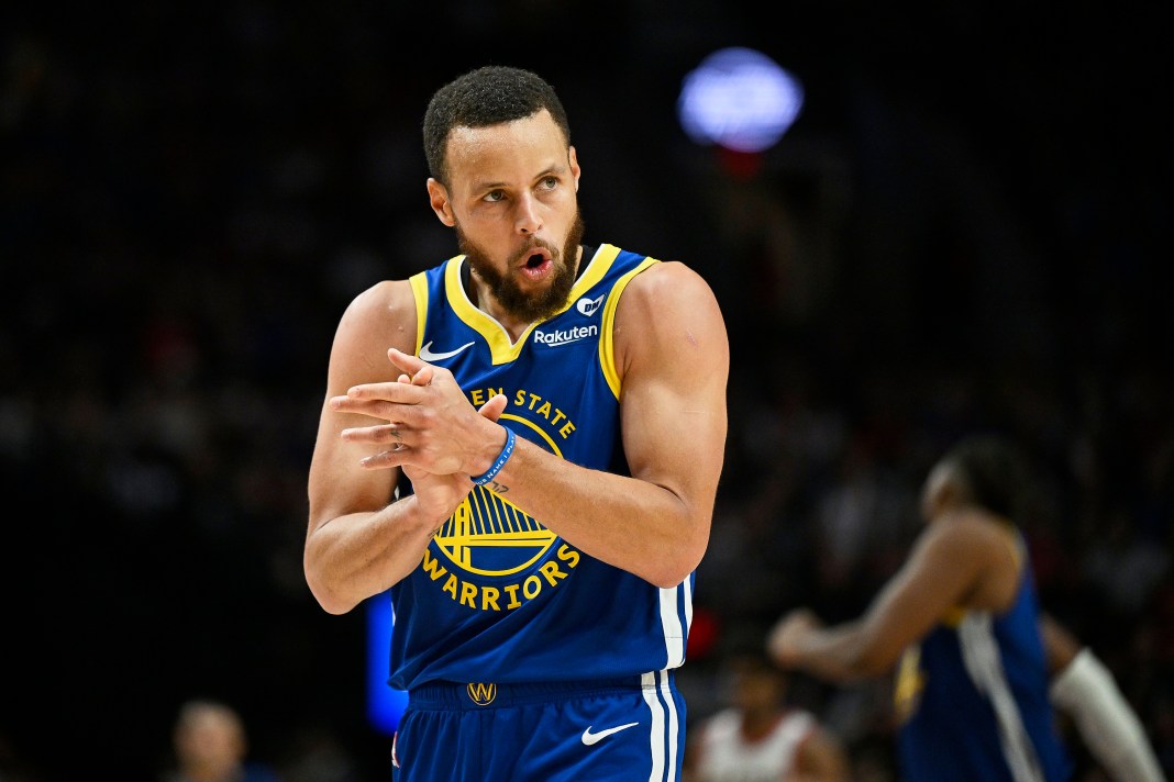 Golden State Warriors guard Stephen Curry (30) claps his hands in celebration during the second half against the Portland Trail Blazers