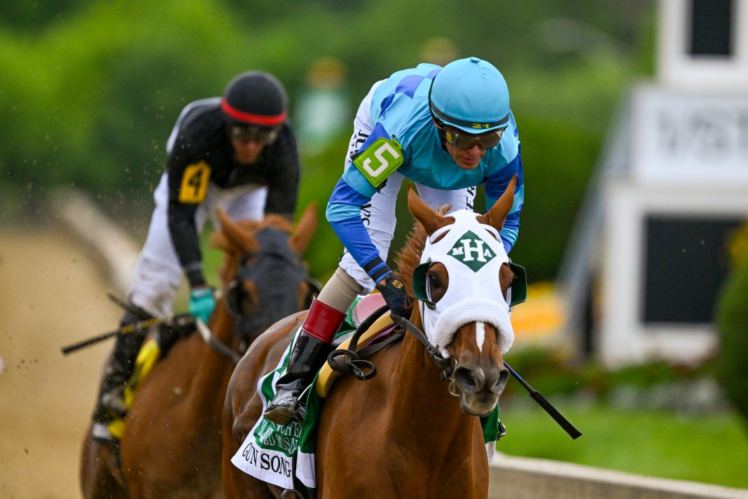 John Velazquez aboard Gun Songpack wins the running of the 100th Black-Eyed Susan stakes at Pimlico Race Course