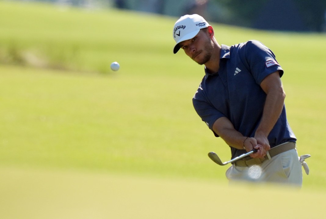 Nicolai Hojgaard chips up onto the sixth green during a practice round for the U.S. Open golf tournament