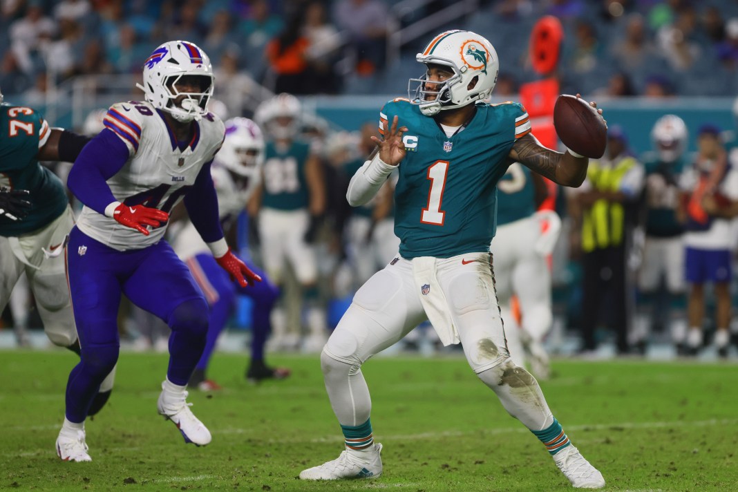 Miami Dolphins quarterback Tua Tagovailoa (1) throws the football against the Buffalo Bills