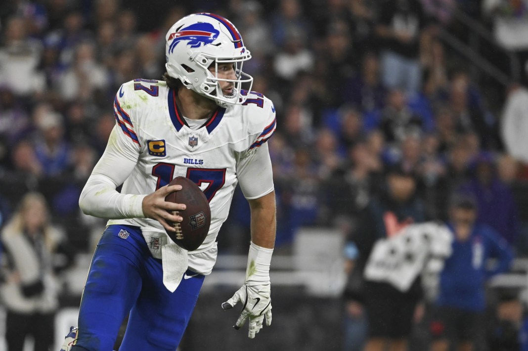 Bills quarterback Josh Allen looks to make a play against the Ravens.