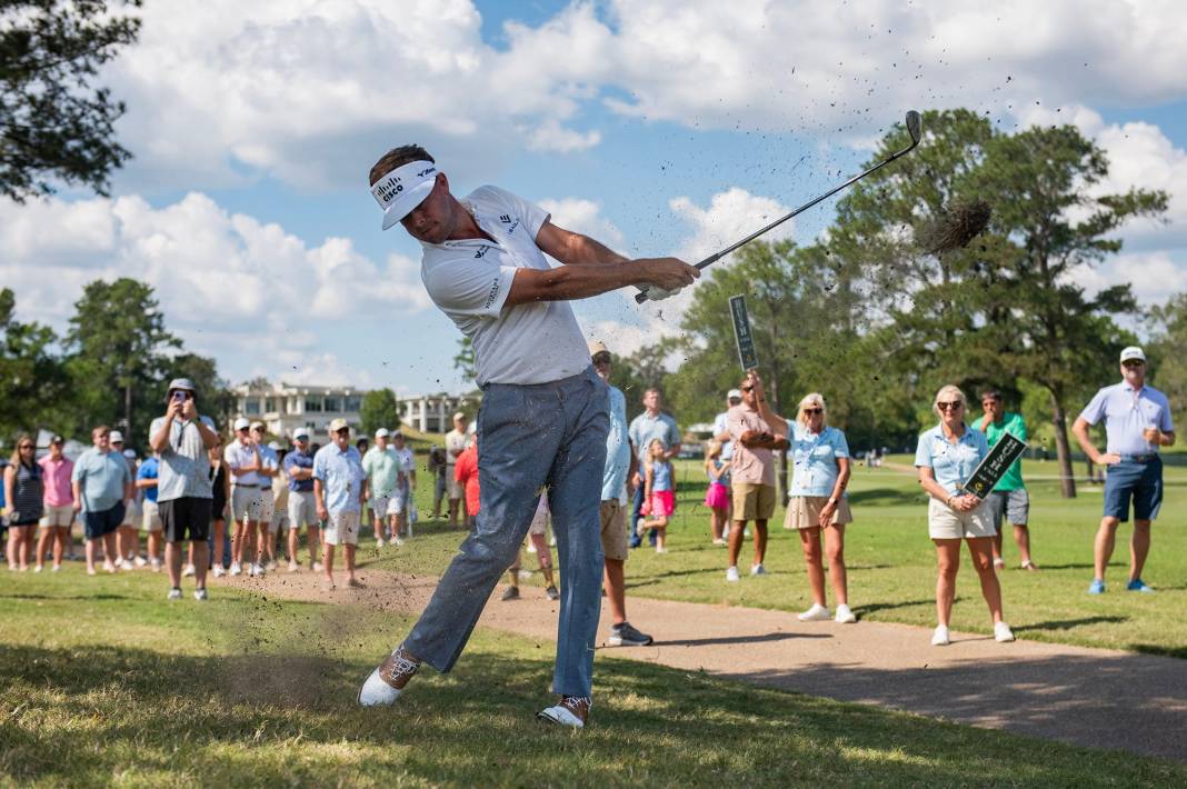 Keith Mitchell of Chattanooga, Tenn., hits his ball onto the 1st green during the Sanderson Farms Championship