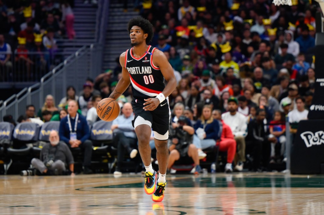 Blazers guard Scoot Henderson brings the ball up in a preseason game.