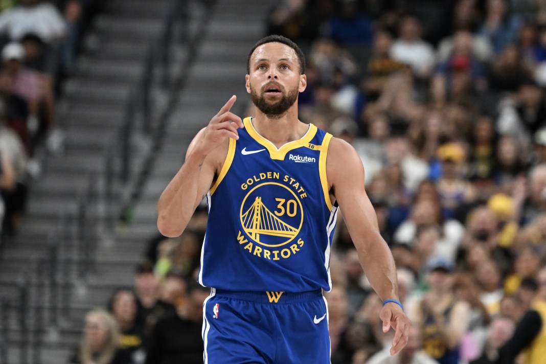 Warriors star Stephen Curry gestures during a preseason game against the Lakers.