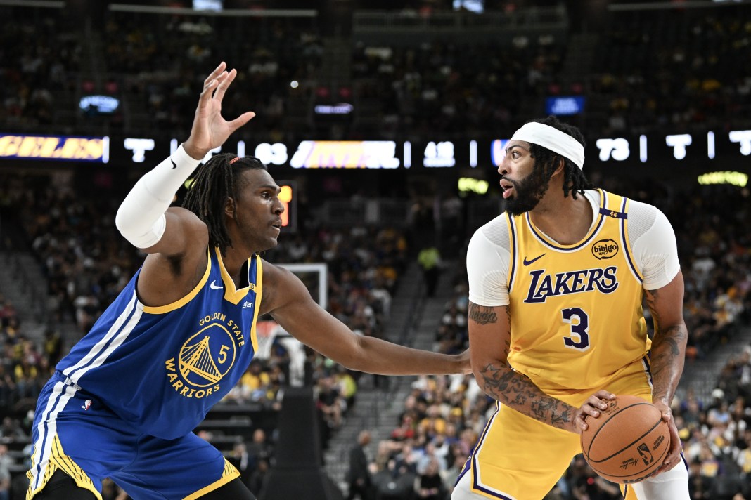 Lakers star Anthony Davis faces up in a meeting with the Warriors in preseason.