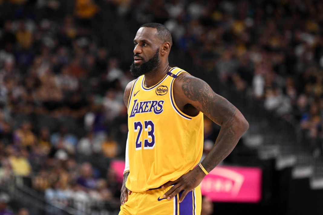 Los Angeles Lakers forward LeBron James (23) looks on against the Golden State Warriors in the first quarter during a preseason game at T-Mobile Arena