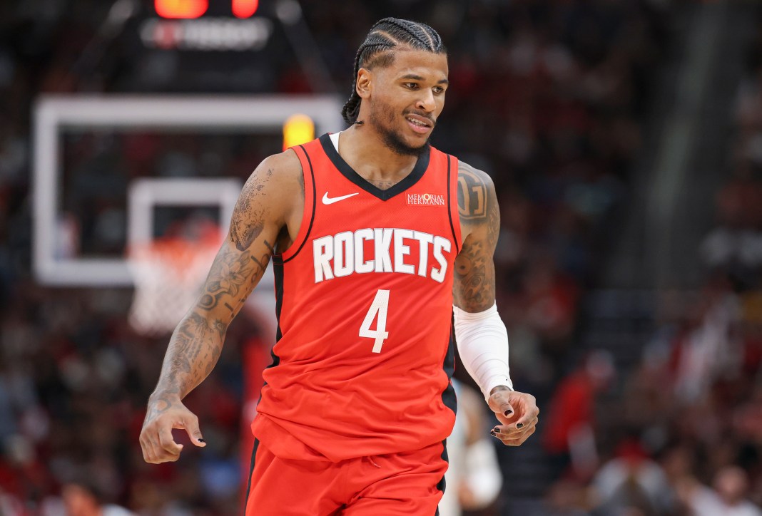 Houston Rockets guard Jalen Green (4) reacts after scoring a basket during the fourth quarter against the Charlotte Hornets