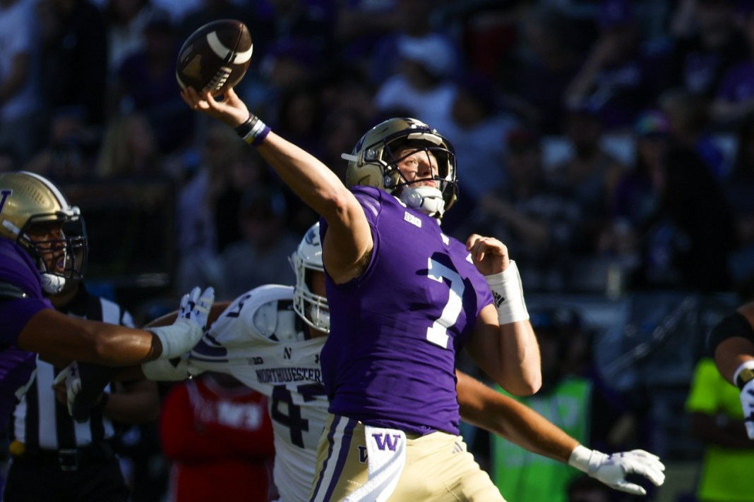 Washington Huskies quarterback Will Rogers (7) passes against the Northwestern Wildcats during the first quarter at Alaska Airlines Field at Husky Stadium